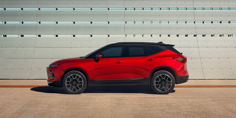 side view of red chevy blazer
