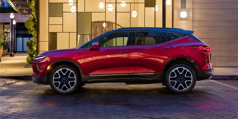 side view of red chevy blazer